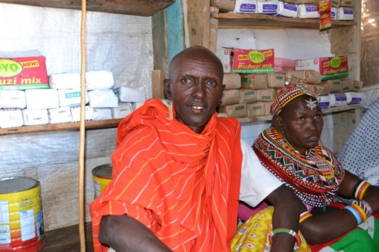 Lekutan Lemarote and his wife at their shop at Komote village in Marsabit 