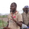 StaffJohn,-HelpAge-Lodwar,-sharing-key-messages-at-a-baraza,-Kataboi-Turkana